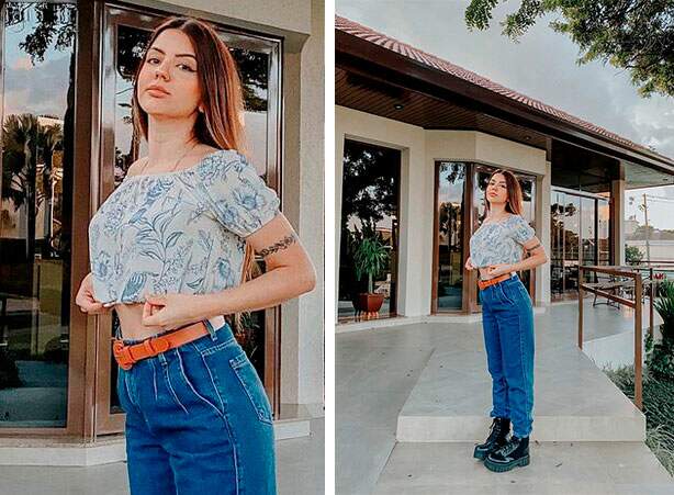 Look de blusa cropped com mom calça jeans e coturno preto