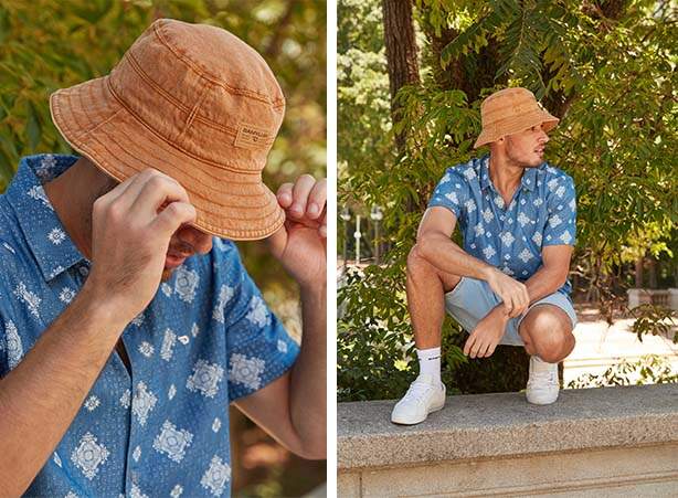 Look com camisa jeans de estampa floral e chapéu bucket hat