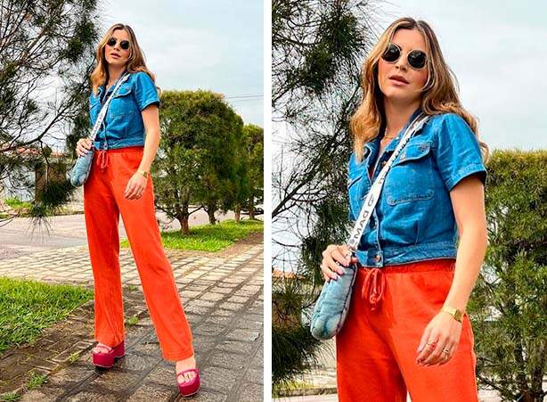 Look com cores complementares com blusa azul em jeans e calça laranja