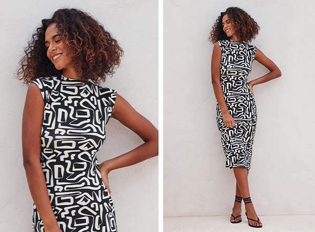 Look preto e branco com vestido em modelo midi com estampa abstrata