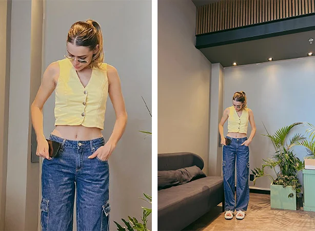 Look com colete e calça cargo jeans