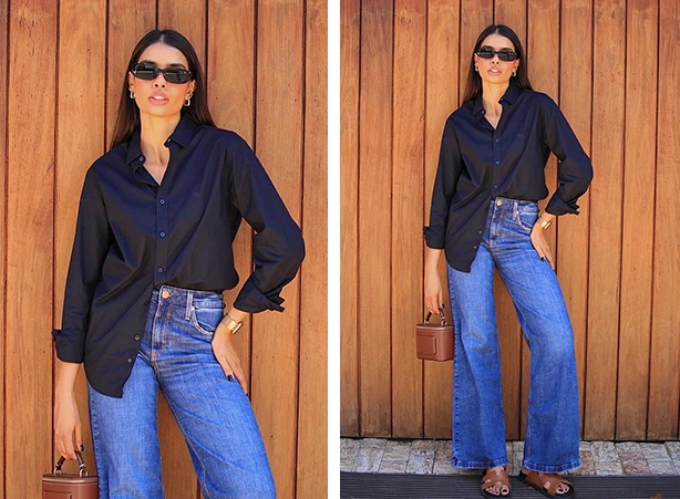 Look com camisa preta e calça jeans