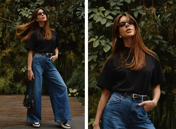 Look com blusa boxy preta de gola alta e calça jeans wide leg