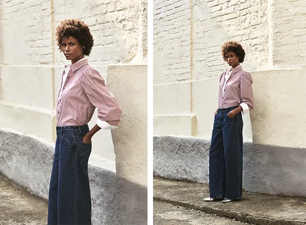 Look feminino de outono com camisa social listrada e calça jeans