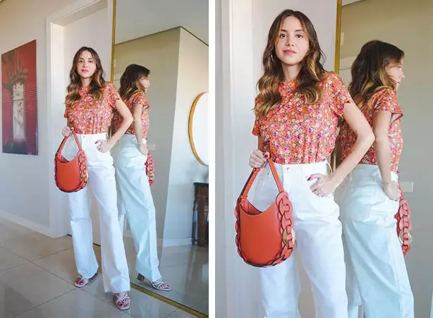Look feminino com calça wide leg branca e camiseta de estampa floral Look feminino com calça wide leg branca e camiseta de estampa floral