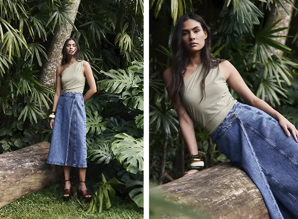 Look com blusa de ombro único e saia jeans midi Look com blusa de ombro único e saia jeans midi