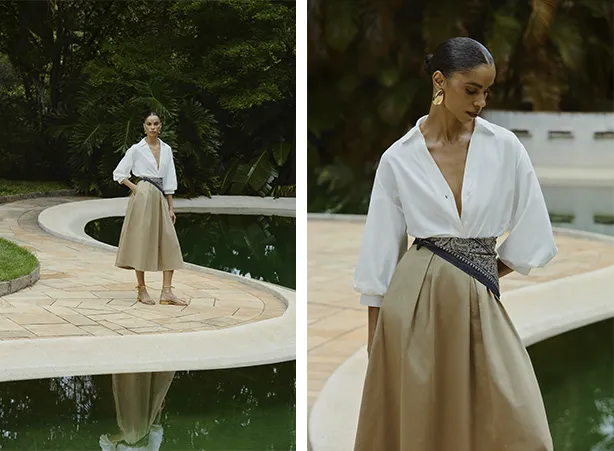 Look com saia midi cáqui e camisa branca