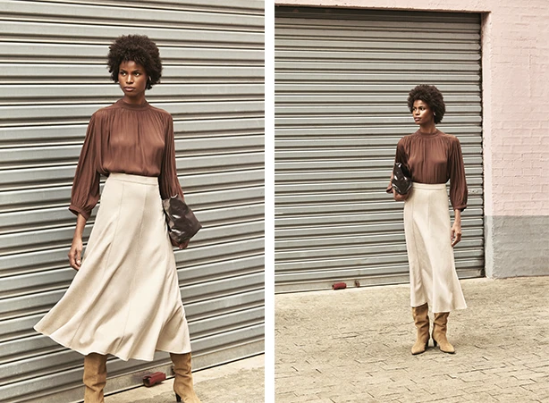 Look com saia midi e blusa marrom
