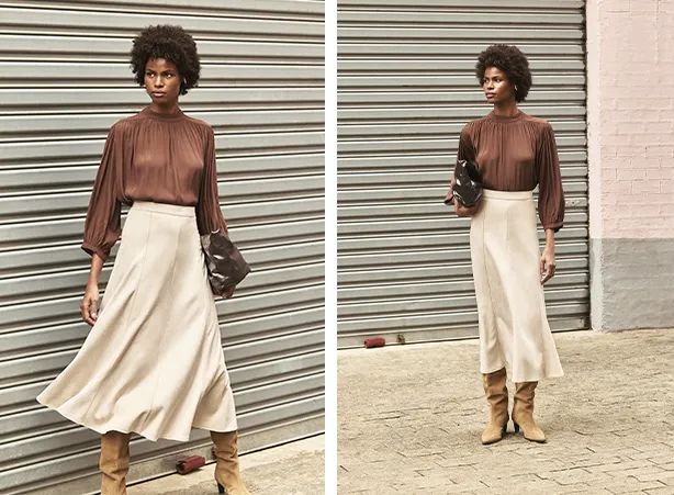 Look com saia midi e bota
