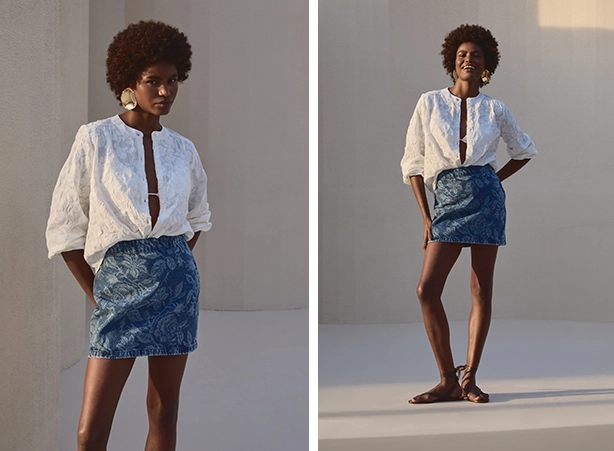 Look com camisa de aspecto bordado e saia jeans com padronagem floral