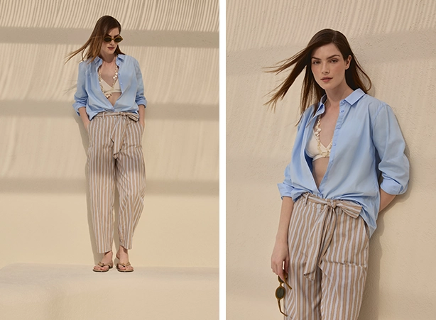 Look feminino com calça listrada e camisa